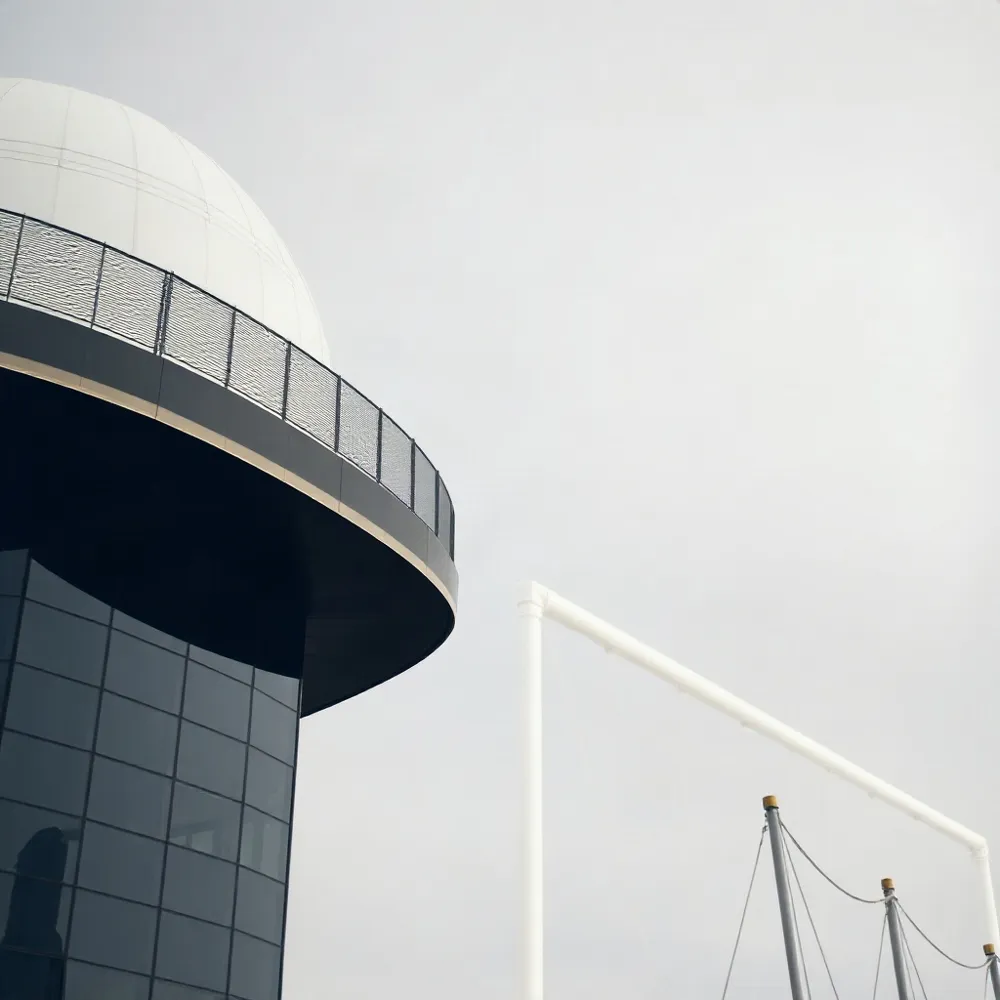 Temporary systems like bosun's chairs, davits, and swing stages require lower upfront investment but introduce operational trade-offs in reach, safety, and labor cost for facade access.