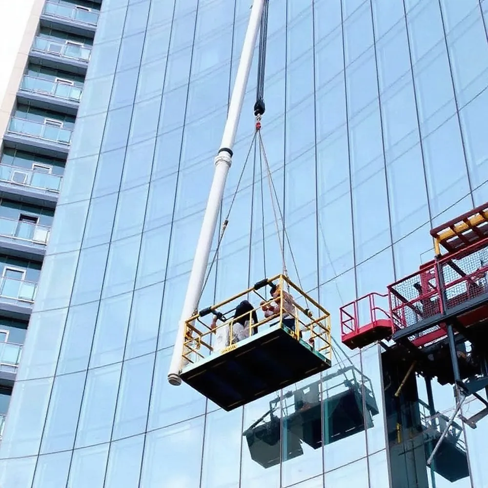 A project-assessed Glass Replacement Unit can hoist a panel alongside the BMU cradle using task-suitable attachments.