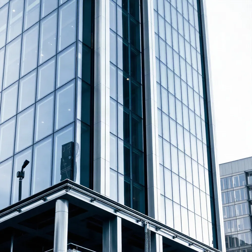 Permanent BMUs eliminate the structural load and ground space constraints of temporary scaffolding while offering precise, automated access for modern high-rise facades.