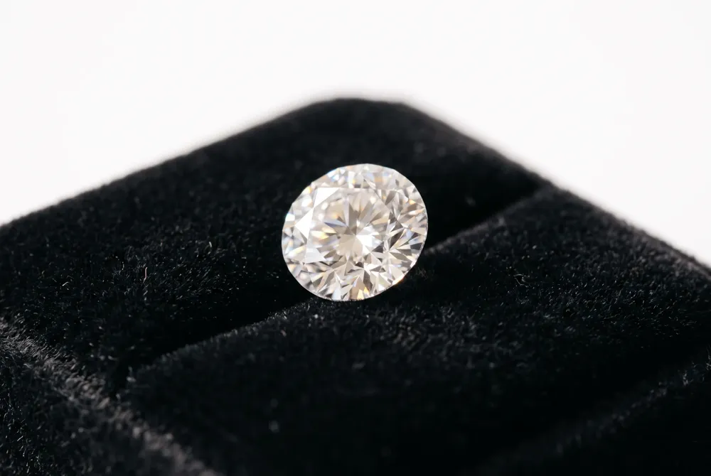 We ensure your precious stone remains secure by utilizing expert mounting techniques that guard delicate corners while preserving your ring's brilliant, refined aesthetic.