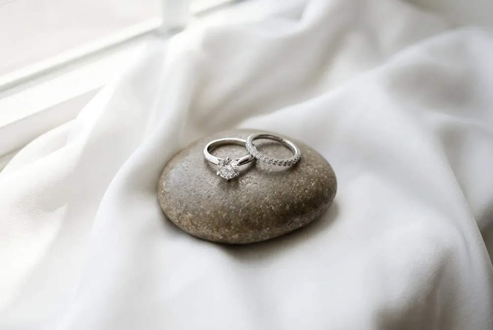 Cushion cuts resist chipping with their rounded corners, while princess cuts shine with extra protection—choose what fits your daily rhythm best.