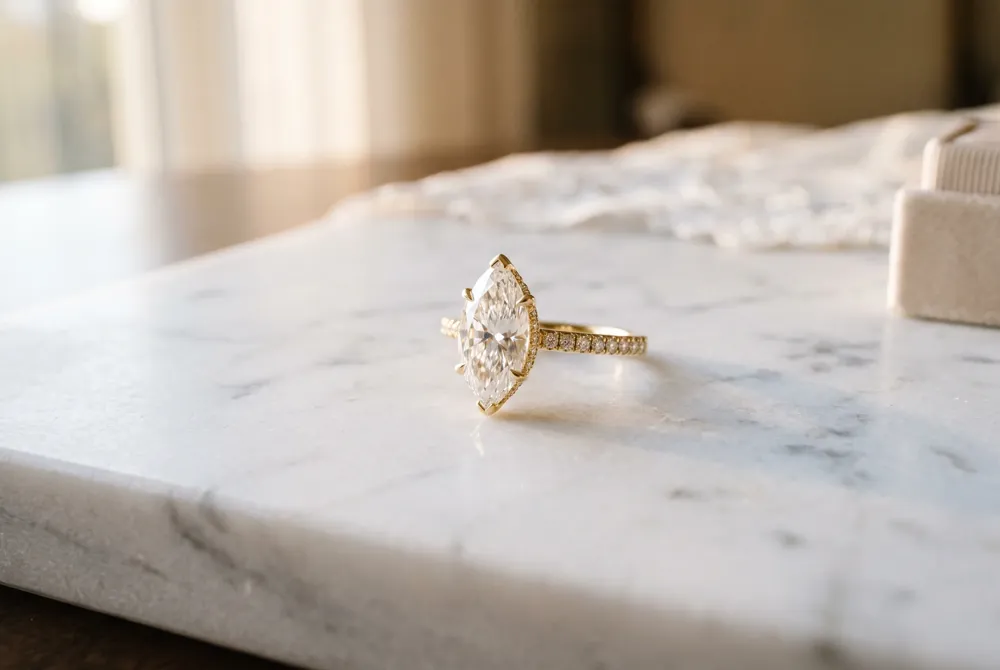 Learn how the marquise's elongated form creates an optical illusion of greater size, offering presence without a heavier carat weight.