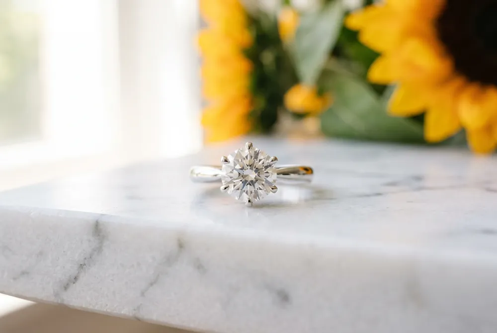 Custom birthstone accents transform your sunflower promise ring into a deeply personal narrative of your shared journey.