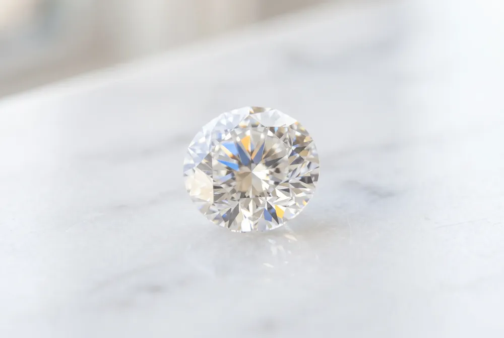 Gain expert insight into how physical density and millimeter measurements influence the perceived size and presence of your chosen engagement stone.