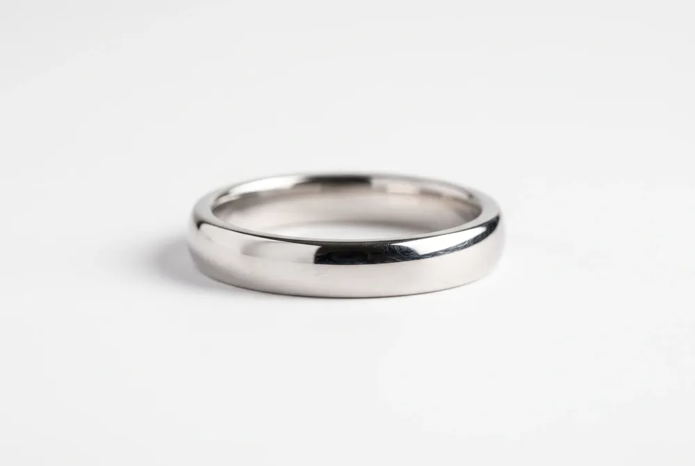 Discover how the sleek, secure elegance of a bezel setting provides both modern protection and a refined, uninterrupted silhouette for your diamond.