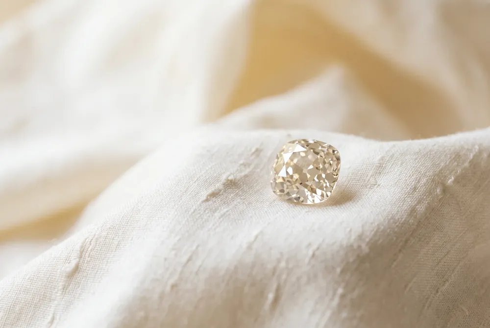 While estimates for this bespoke ring range widely, its true value lies in the rarity of the antique cut and the artistry of hand craftsmanship.
