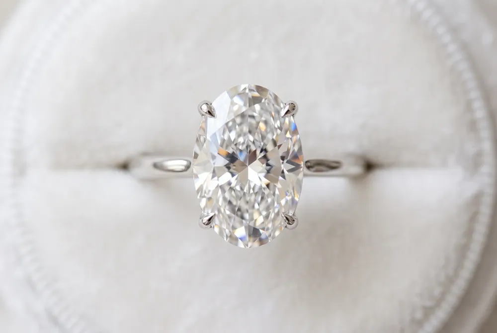 Discover how the strategic geometry of elongated diamonds maximizes your ring's visual presence on the hand with unparalleled grace.