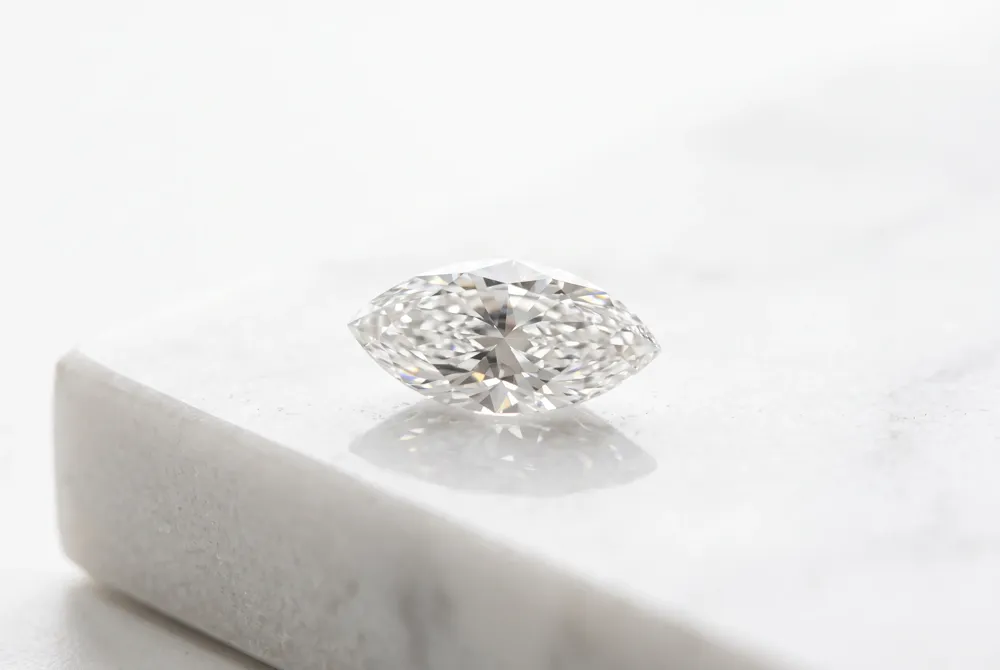 Experience the captivating revival of the marquise cut, a regal silhouette that bridges vintage romance with contemporary, elongated grace.