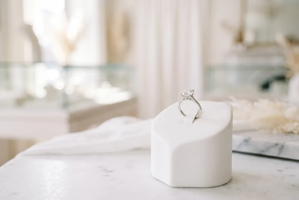The bold east-west orientation offers a fashion-forward, architectural approach to the classic cushion cut for the style-conscious individual.