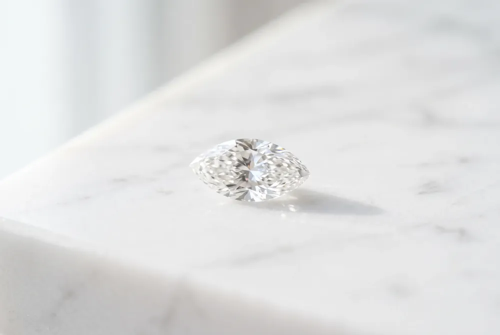 Discover the timeless elegance of the marquise cut, a regal silhouette known for its breathtaking elongating effect and deep historical roots.