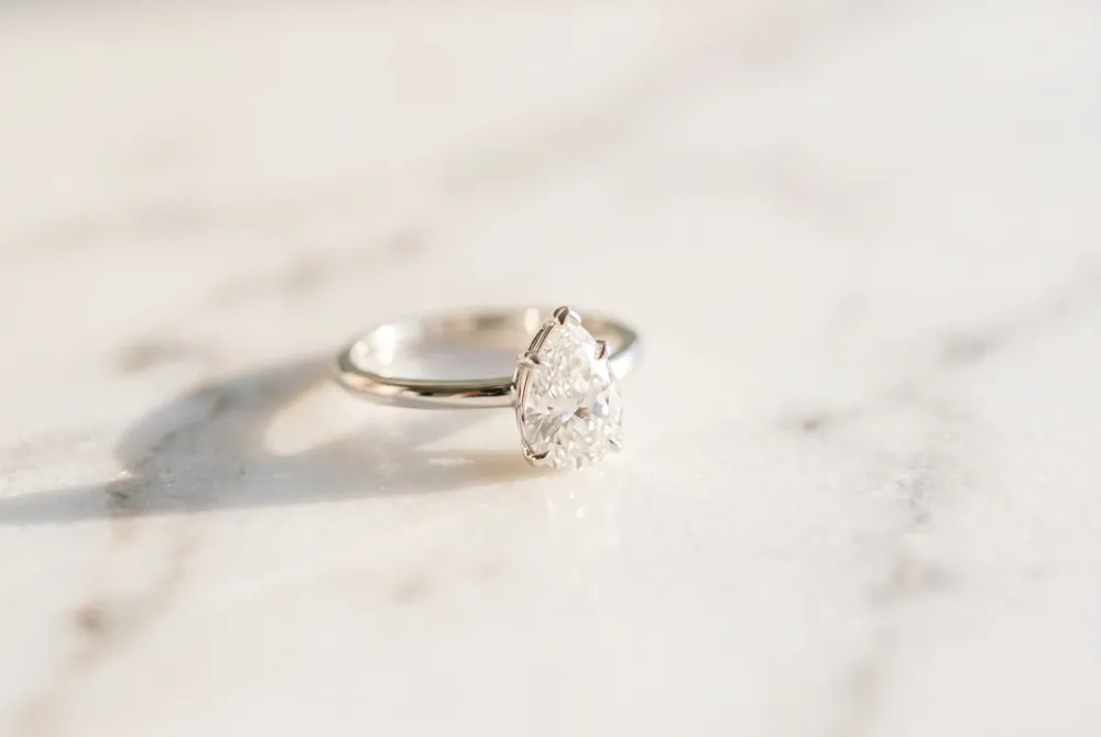 Embrace the romantic, elongated charm of the pear shape, a unique silhouette that blends timeless elegance with contemporary edge.