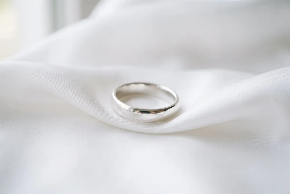 An eternity band encircles your finger with unbroken brilliance, a timeless symbol of everlasting love.