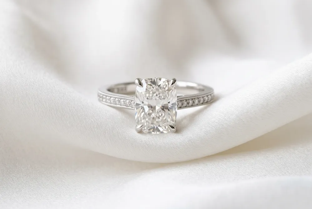 Elongated cushion cuts offer a refined and modern aesthetic that gracefully lengthens the finger with sophisticated proportions.