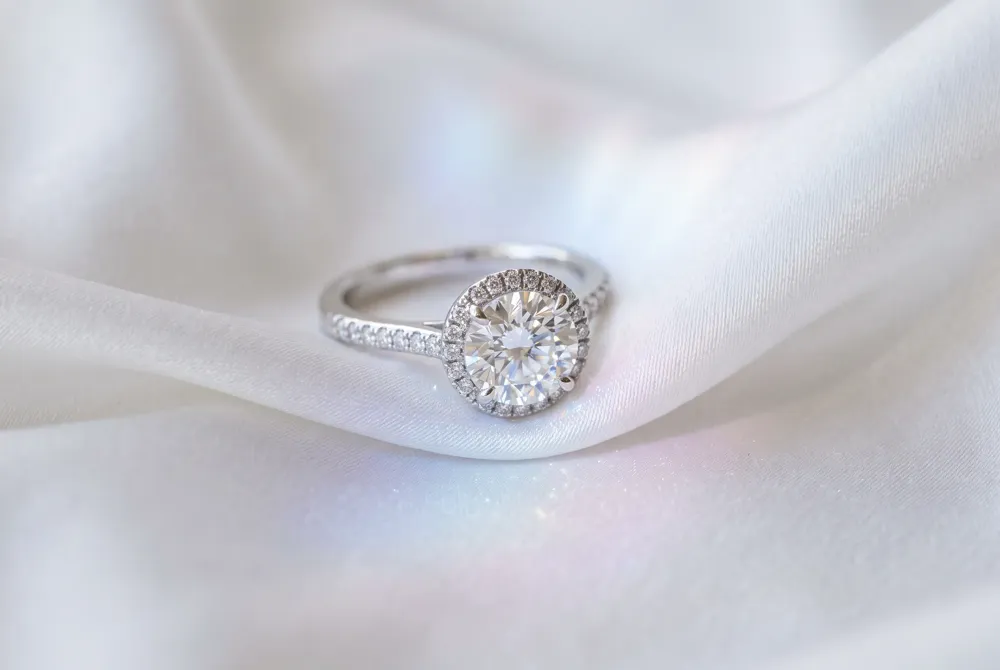A luminous platinum band with concentric rings of lab-grown diamonds that mimic sunflower petals, offering ethical luxury without sacrificing brilliance.