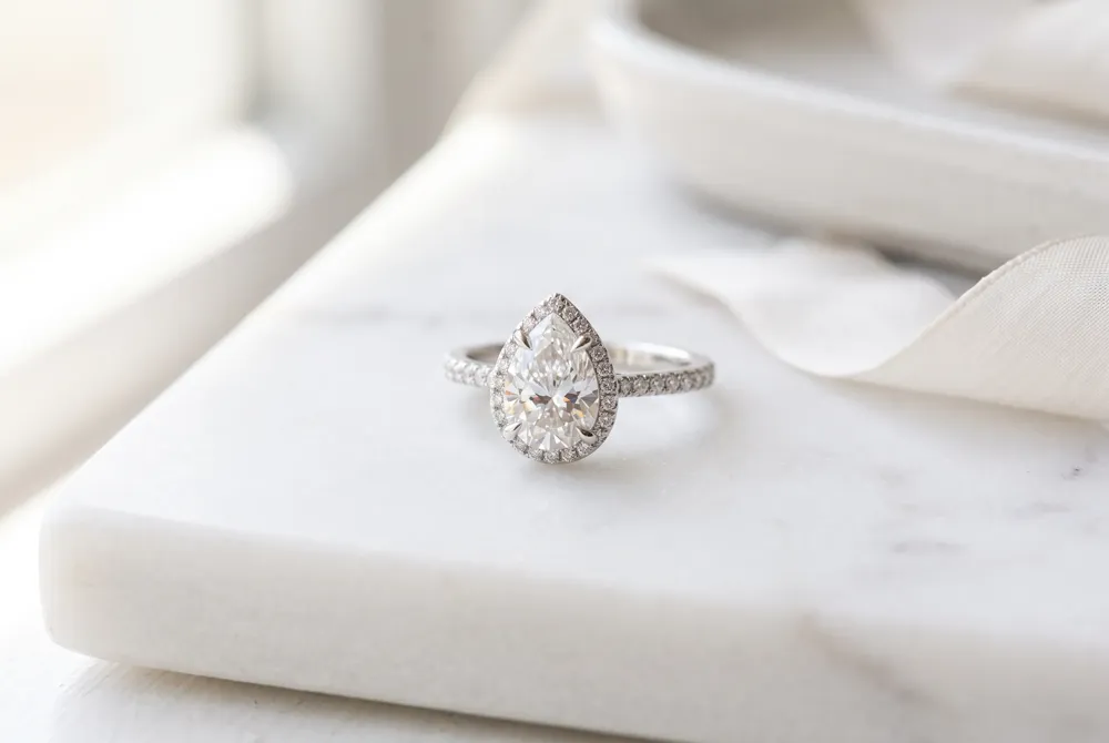 The elongated geometry of the pear cut creates a striking visual presence, offering a more generous and flattering silhouette on the hand.