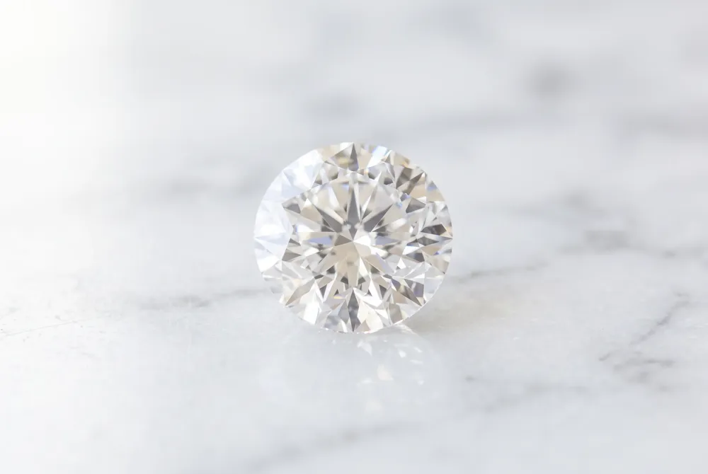 The bezel setting provides a sleek, modern frame that protects the marquise points while ensuring a stunning and secure statement of grace.