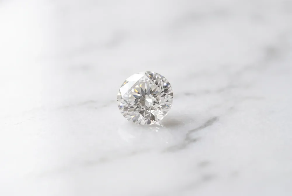 Our expert craftsmanship ensures your precious stone is protected by secure settings that harmonize seamlessly with its delicate, tapered design.