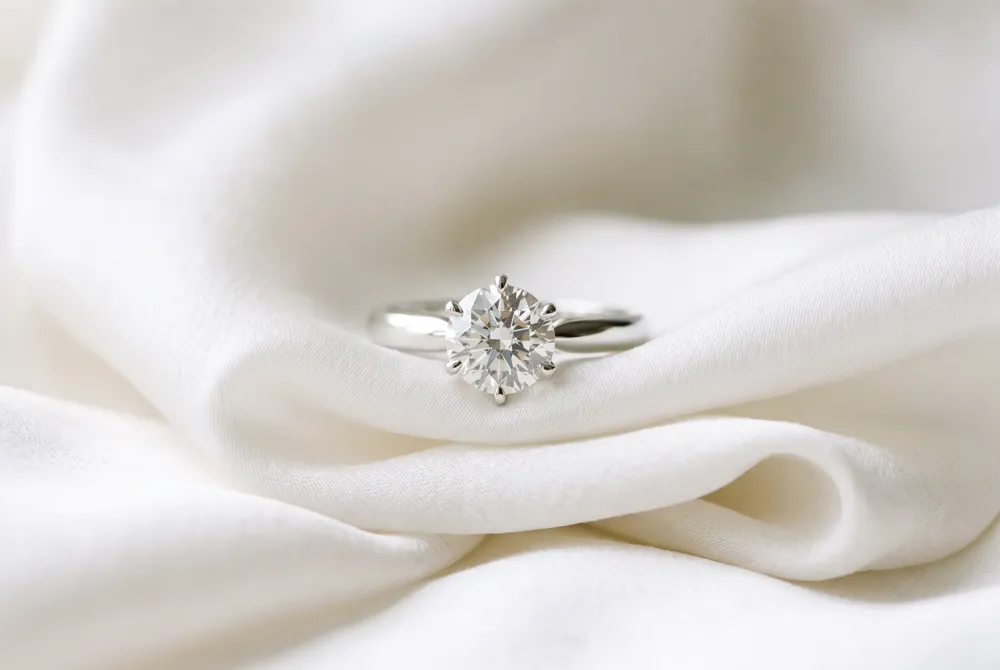 Experience the regal history and timeless allure of the marquise cut, a brilliant choice for the discerning bride who seeks modern distinction.