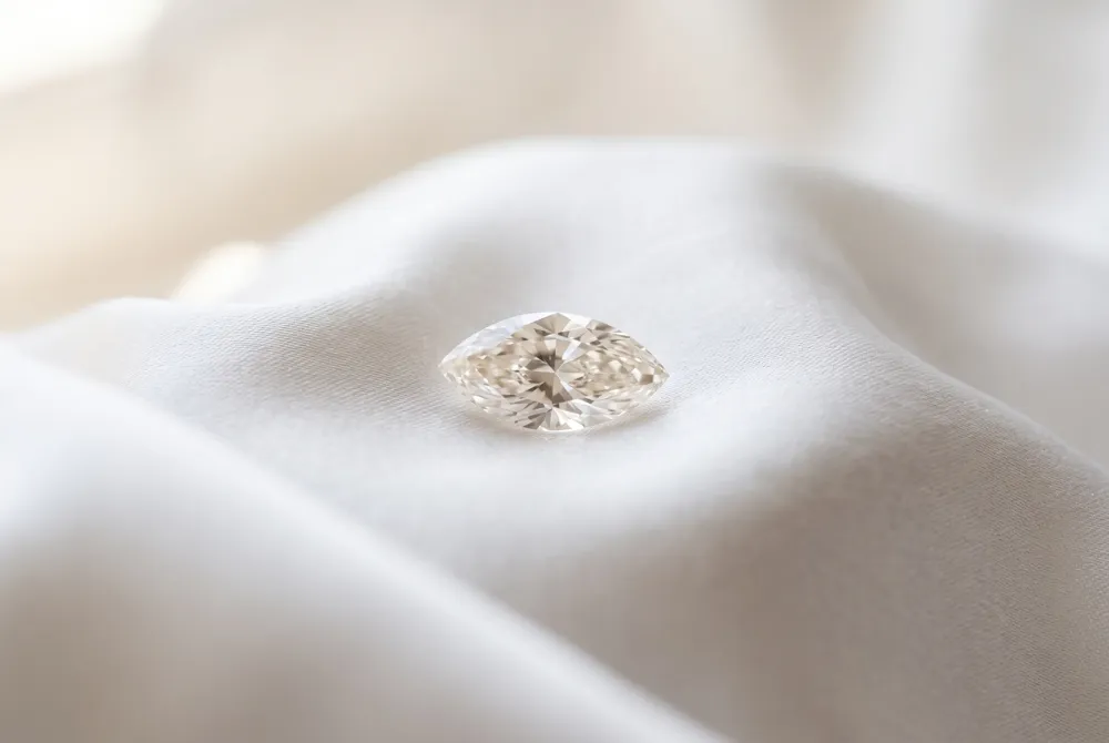 The marquise cut reveals body color more prominently, allowing for strategic choices that maximize both beauty and budget.