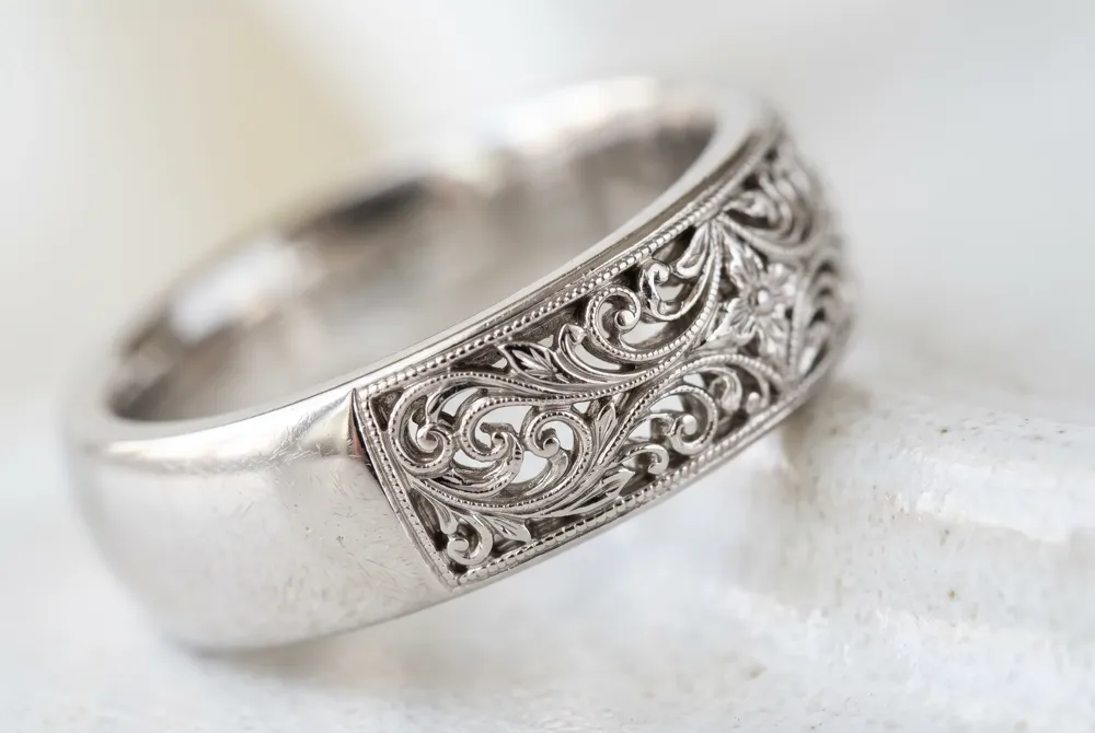 Elevate your engagement ring with intricate hand-engraved filigree, creating a bespoke heirloom that mirrors the storytelling of truly exceptional jewelry.