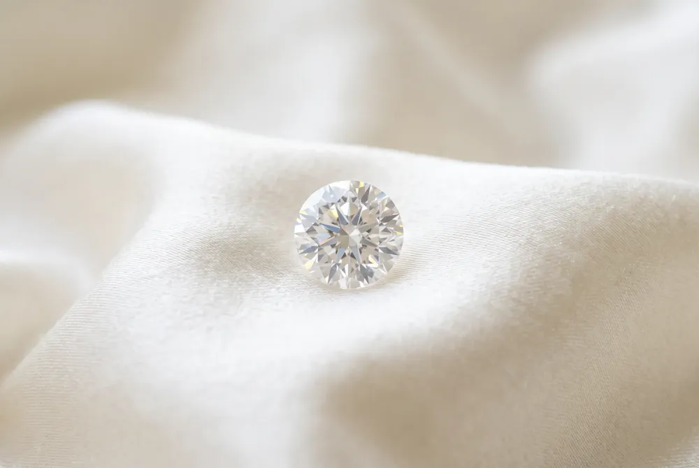 The round brilliant's perfect symmetry delivers unmatched sparkle and enduring elegance in every setting.