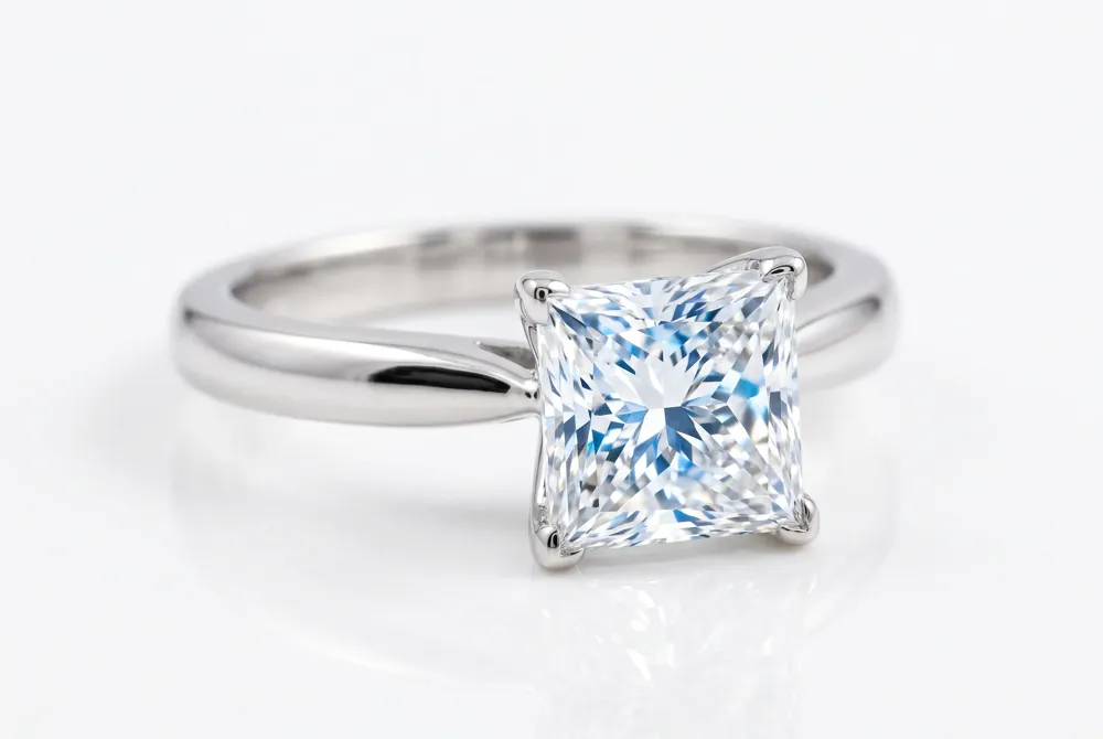 Through a unique arrangement of chevron and step facets, a well-cut princess achieves a fire and sparkle that gracefully rivals the classic round brilliant.