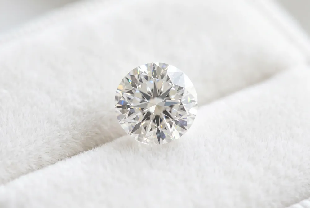 Ensure your center stone remains secure and breathtaking with expert guidance on protective settings tailored for both angular and rounded silhouettes.