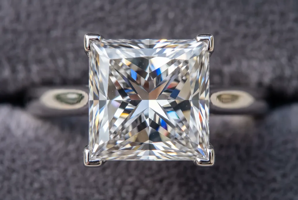 Master the interplay of depth and table percentages, the two key proportions that unlock a princess cut diamond's full brilliance.