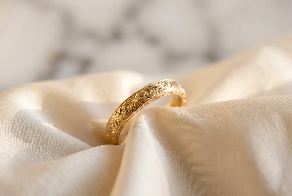 Yellow gold, once overlooked, now returns as a favorite for its rich, romantic warmth, and hand-engraved details bring an heirloom-quality artistry to every modern ring.
