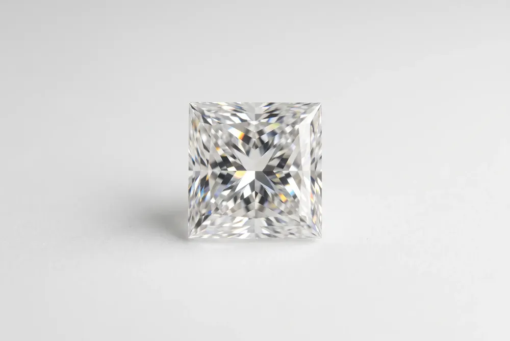 Discover how the princess cut's chevron faceting creates bold, angular flashes of light that set it apart from any other diamond shape.