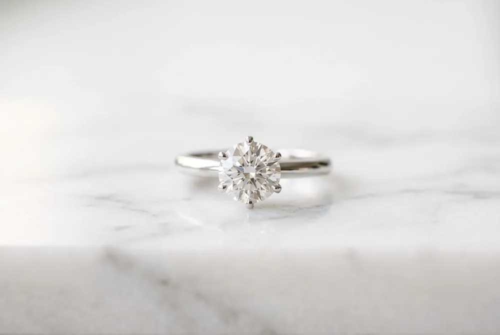 Ensure the longevity of your exquisite princess cut stone with custom-engineered settings designed to protect its unique geometric silhouette.