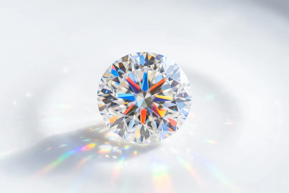 Experience the captivating allure of moissanite, a gemstone renowned for its superior light refraction and vibrant, prismatic fire that outshines traditional choices.