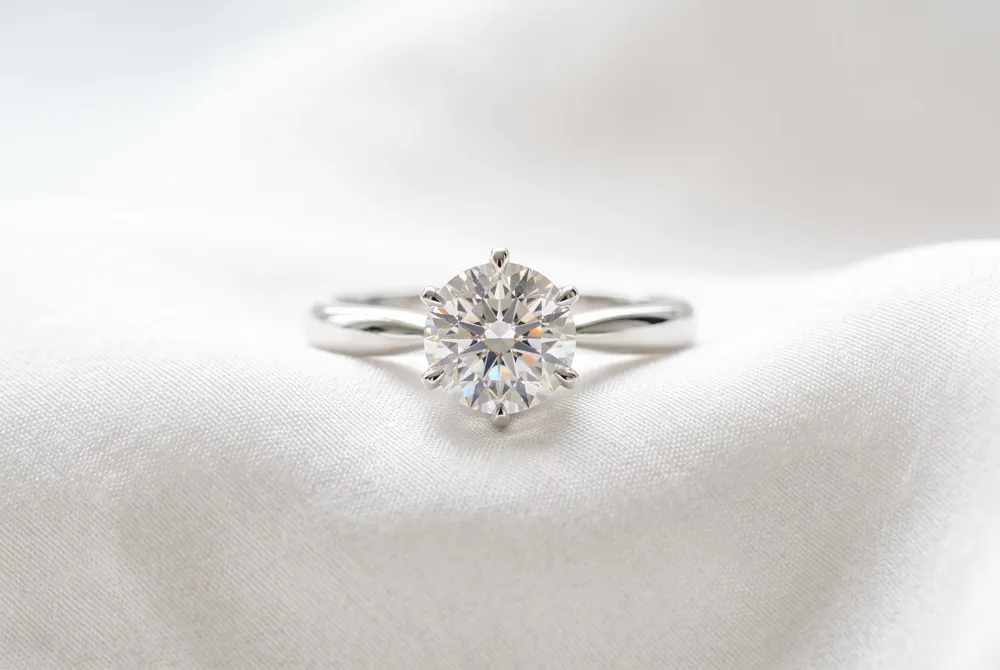 Embrace the timeless elegance of a sophisticated cushion cut silhouette, meticulously crafted to echo the refined grace of iconic celebrity style.