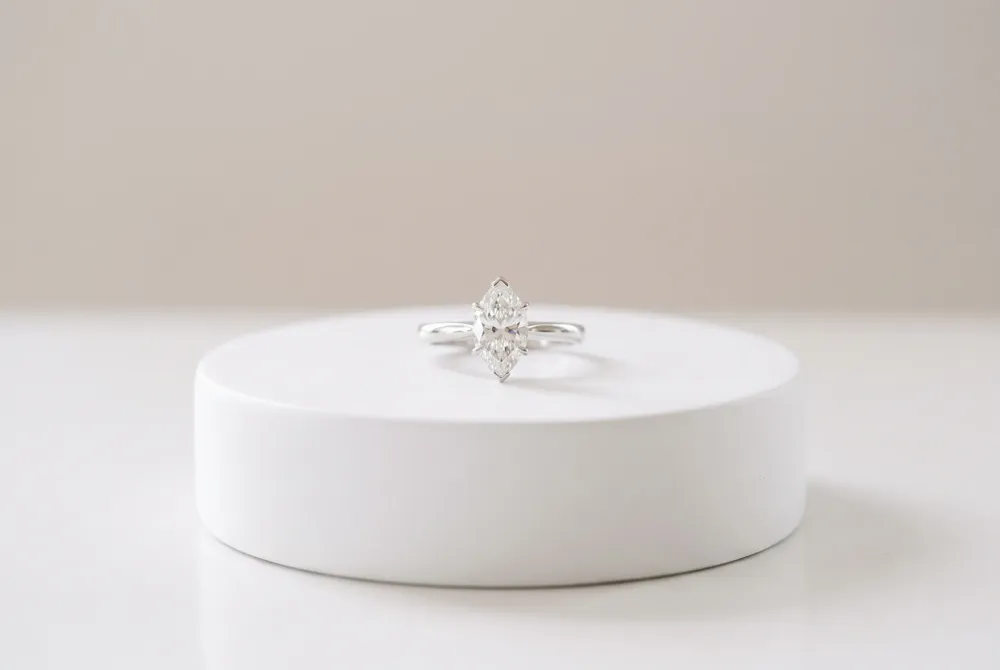 Discover the storied allure of the marquise cut, an eighteenth century silhouette crafted to mirror a smile and celebrated for its graceful, elongated presence on the hand.