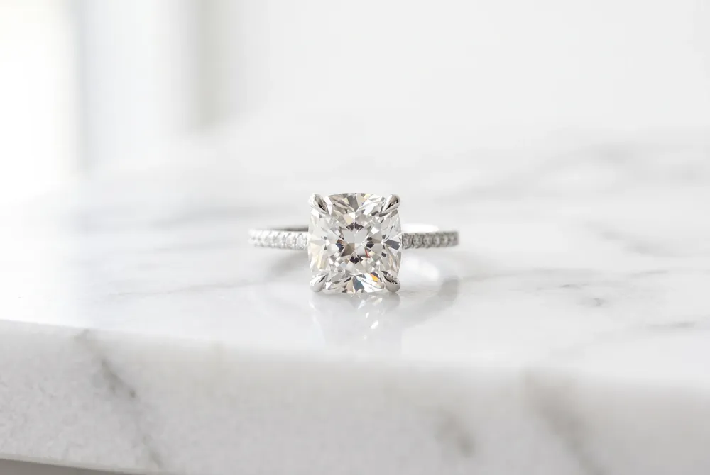 Discover a contemporary aesthetic with elongated cushion cut designs that provide a graceful and slender profile.