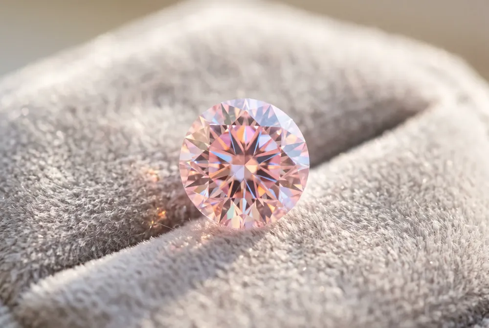 When selecting your pink moissanite ring, consider how each brilliant cut flatters the stone's blush color, suits your finger, and fits your lifestyle and budget.