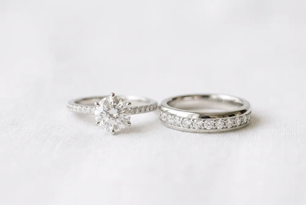 An engagement ring captures the promise of a proposal, while a wedding band seals the union during the ceremony, together telling your complete love story.