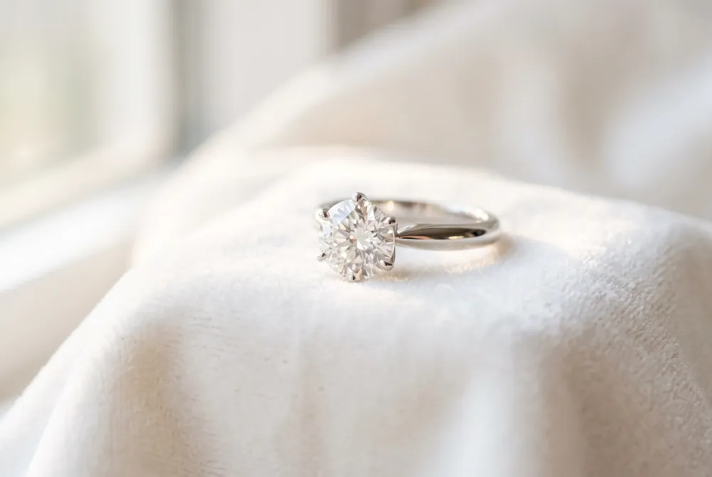 Allow your ceremony to unfold with grace by choosing the ring placement that best reflects your comfort and cherished personal traditions.