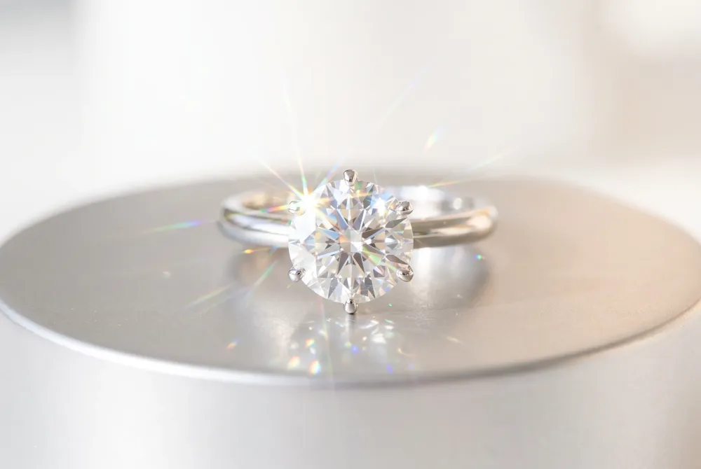 Moissanite captivates with its vibrant fire and extraordinary sparkle, offering a distinctive and affordable radiance.