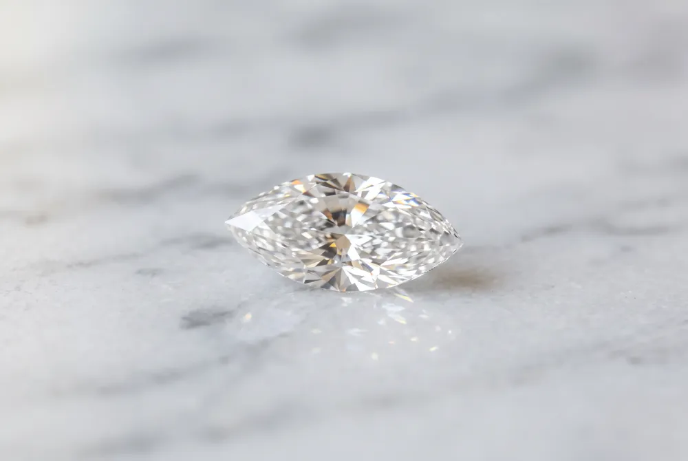 Modern couples are increasingly drawn to the sophisticated, expansive beauty of the marquise diamond as a unique alternative to traditional shapes.