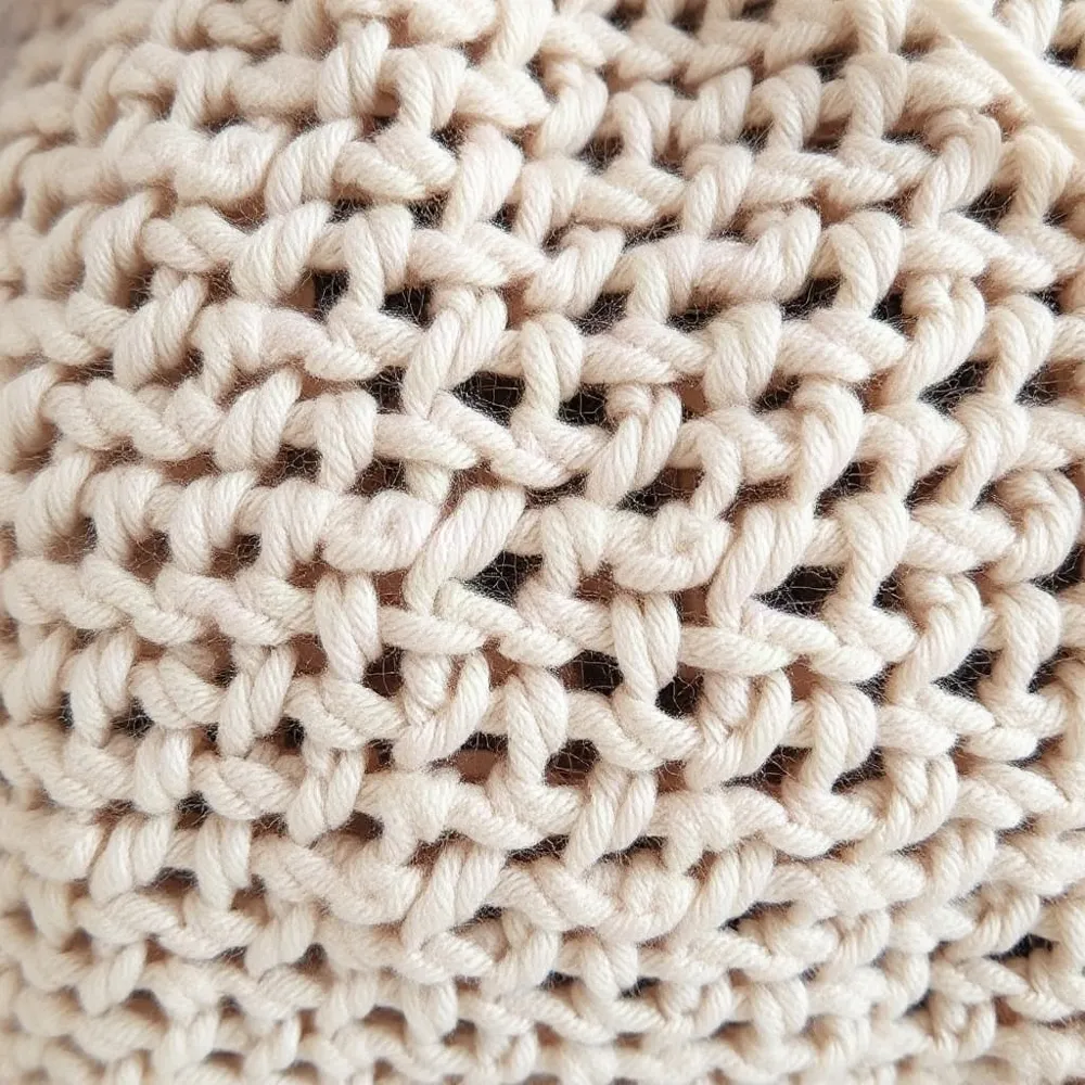 A dense, tight stitch, mercerised cotton yarn, and a fully lined interior transform a beautiful crochet bag into a lasting daily companion.