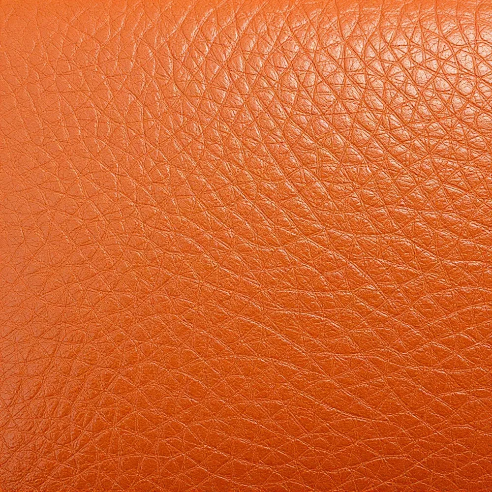 Full-grain calf leather represents the pinnacle of leather craftsmanship, its natural surface preserved to develop a rich patina that marks authentic luxury and durability.