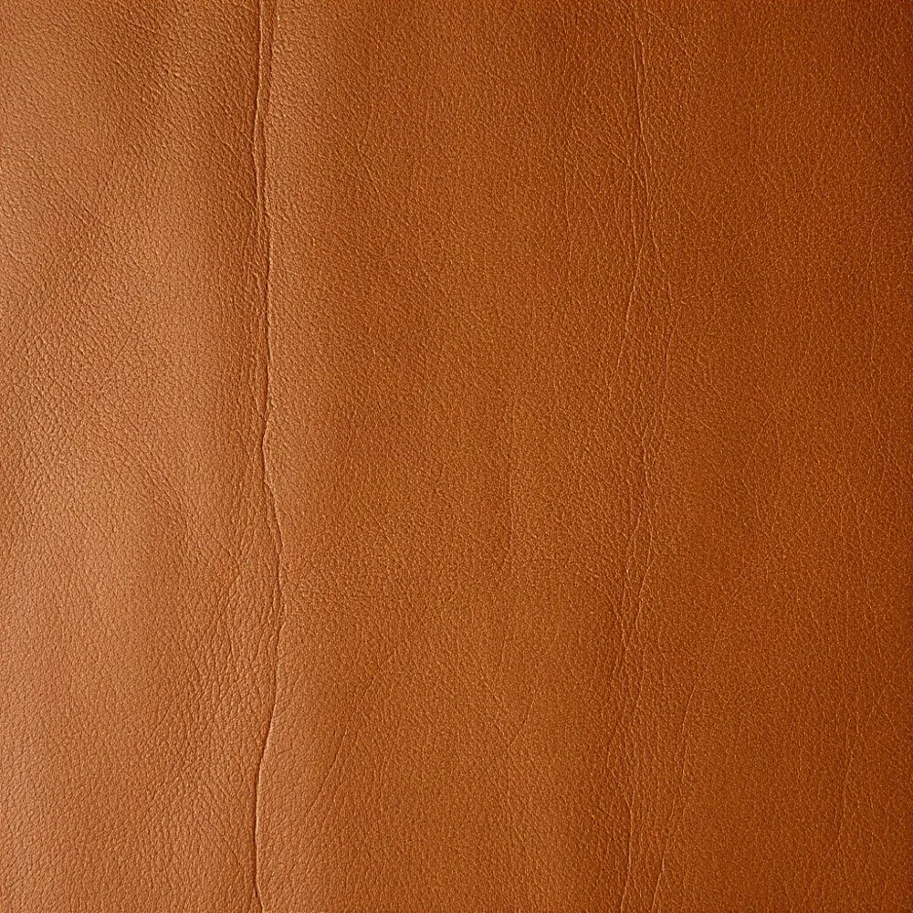 Full-grain calf leather is a living material that molds to your foot and develops a rich patina over time, making each pair a personal artifact of the wearer's journey.